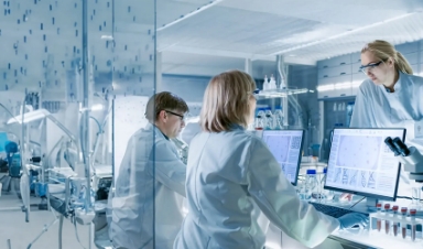 Colleagues collaborating on a GenAI-driven automation workflow